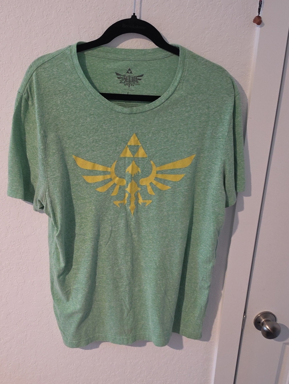 Men's Green Graphic Tee with Yellow Emblem - The Legend of Zelda